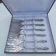 6 cake forks in a box
