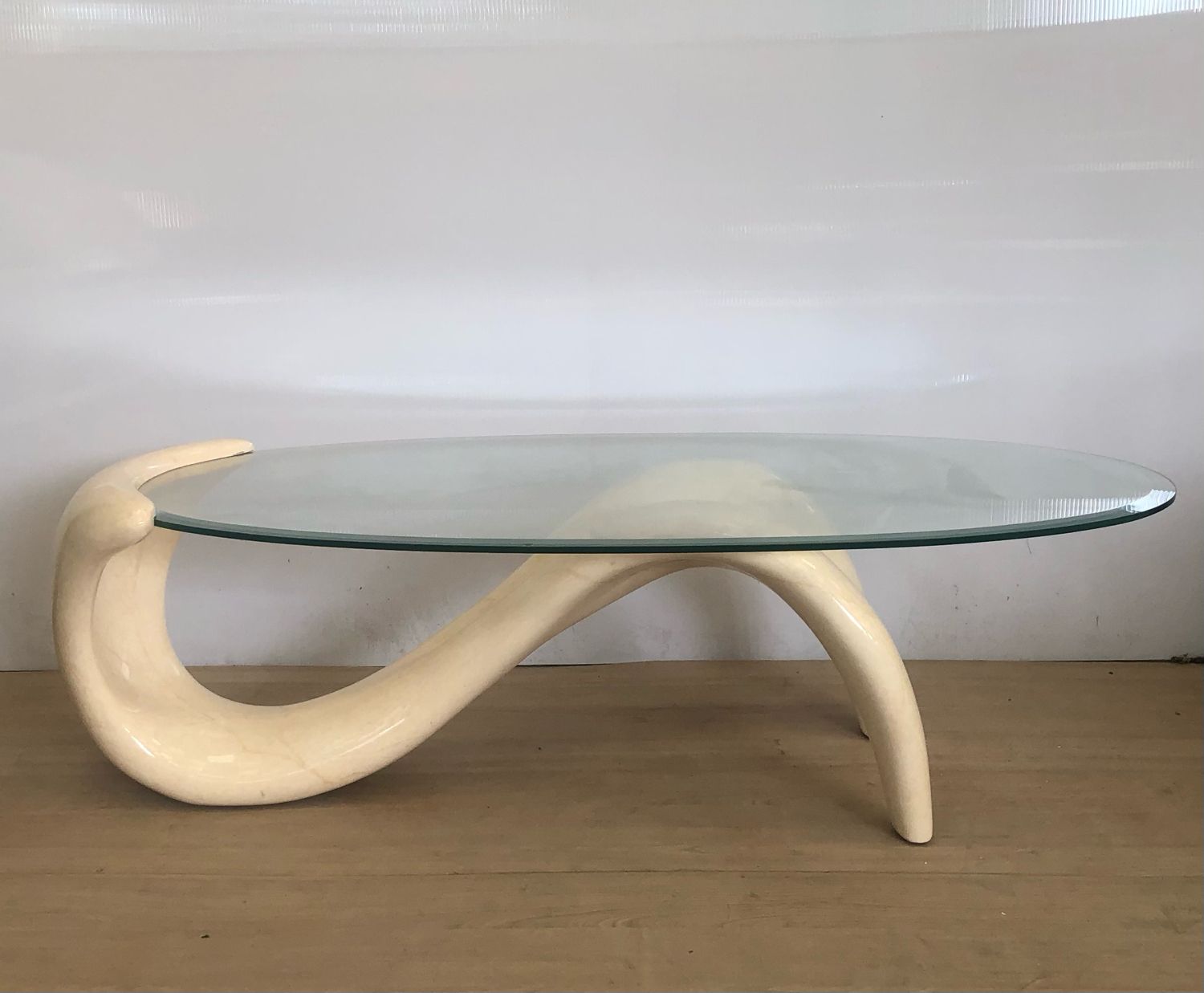 Abstract coffee table in the shape of a woman and marbled fiberglass