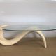 Abstract coffee table in the shape of a woman and marbled fiberglass