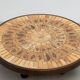 Round coffee table by Roger Capron