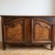 Antique storage furniture in walnut and walnut burl.