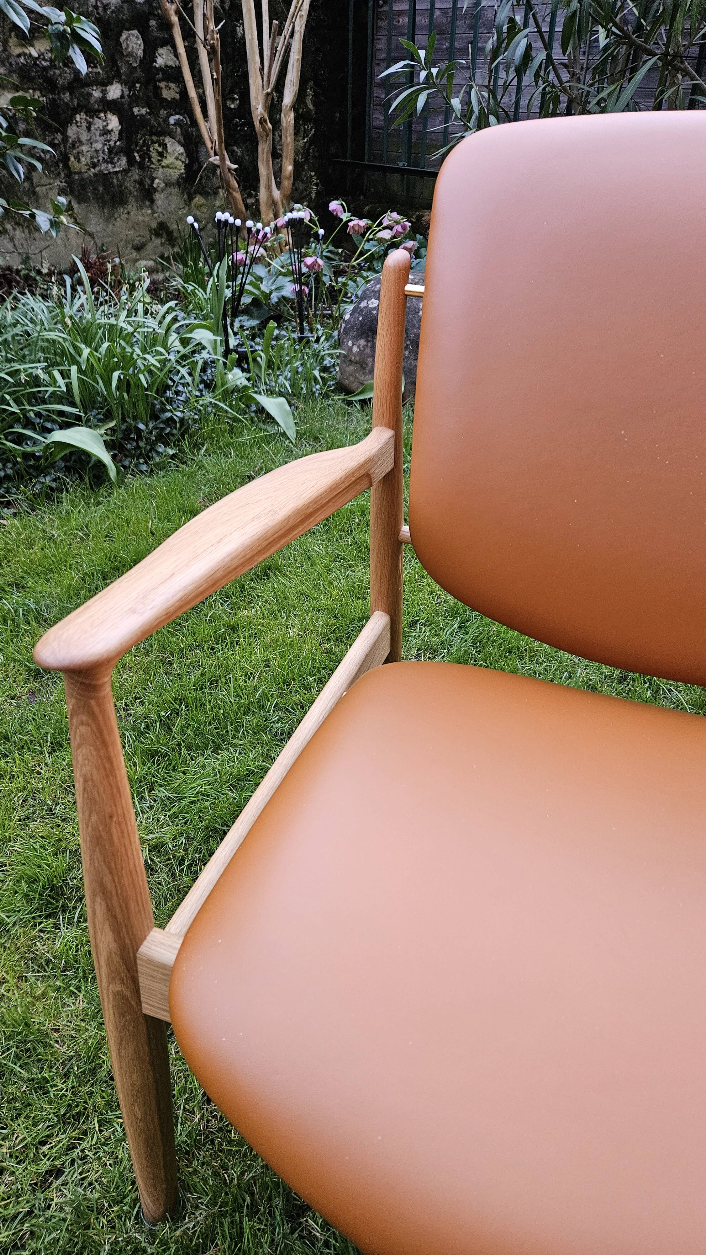 2 "The French Chair" seats by designer Finn Juhl and 1 matching footrest.