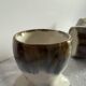 Set of 4 vintage egg cups in glazed ceramic.