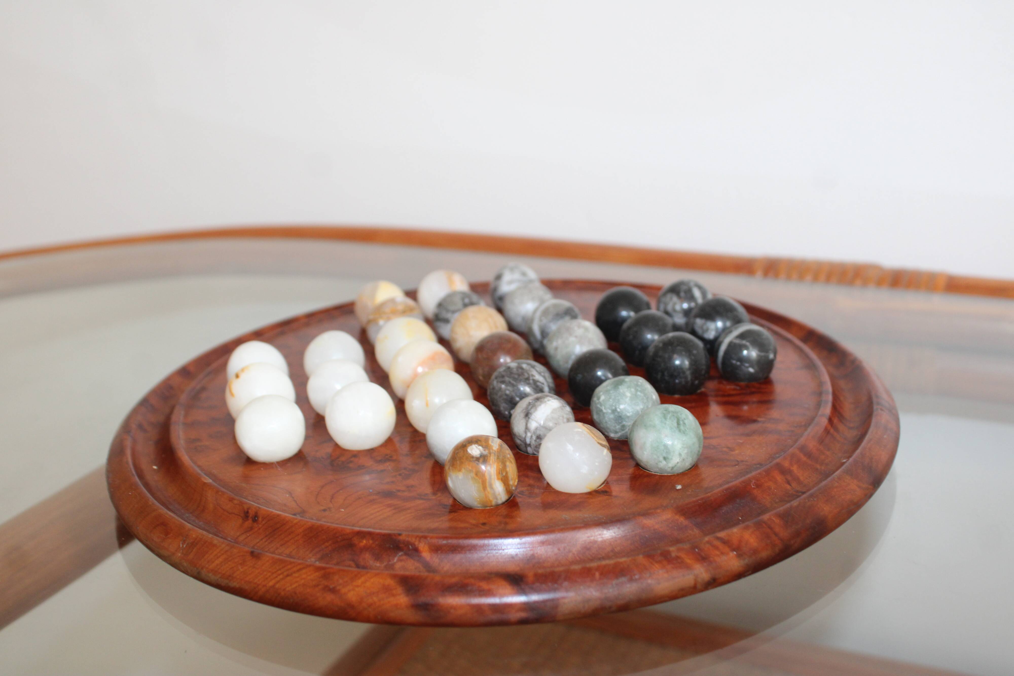 Solitaire game or mineral abacus