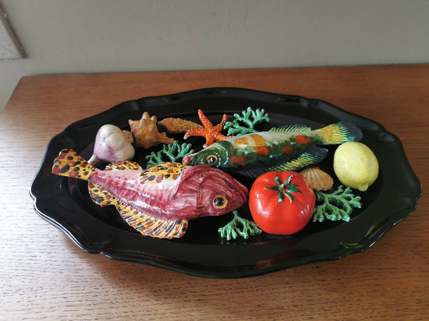 Vintage barbotine dish with fish decoration in relief