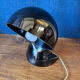 Dalù table lamp – design by Vico Magistretti, Artemide