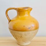 Vintage jug in glazed earth