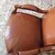 Leather armchair signed