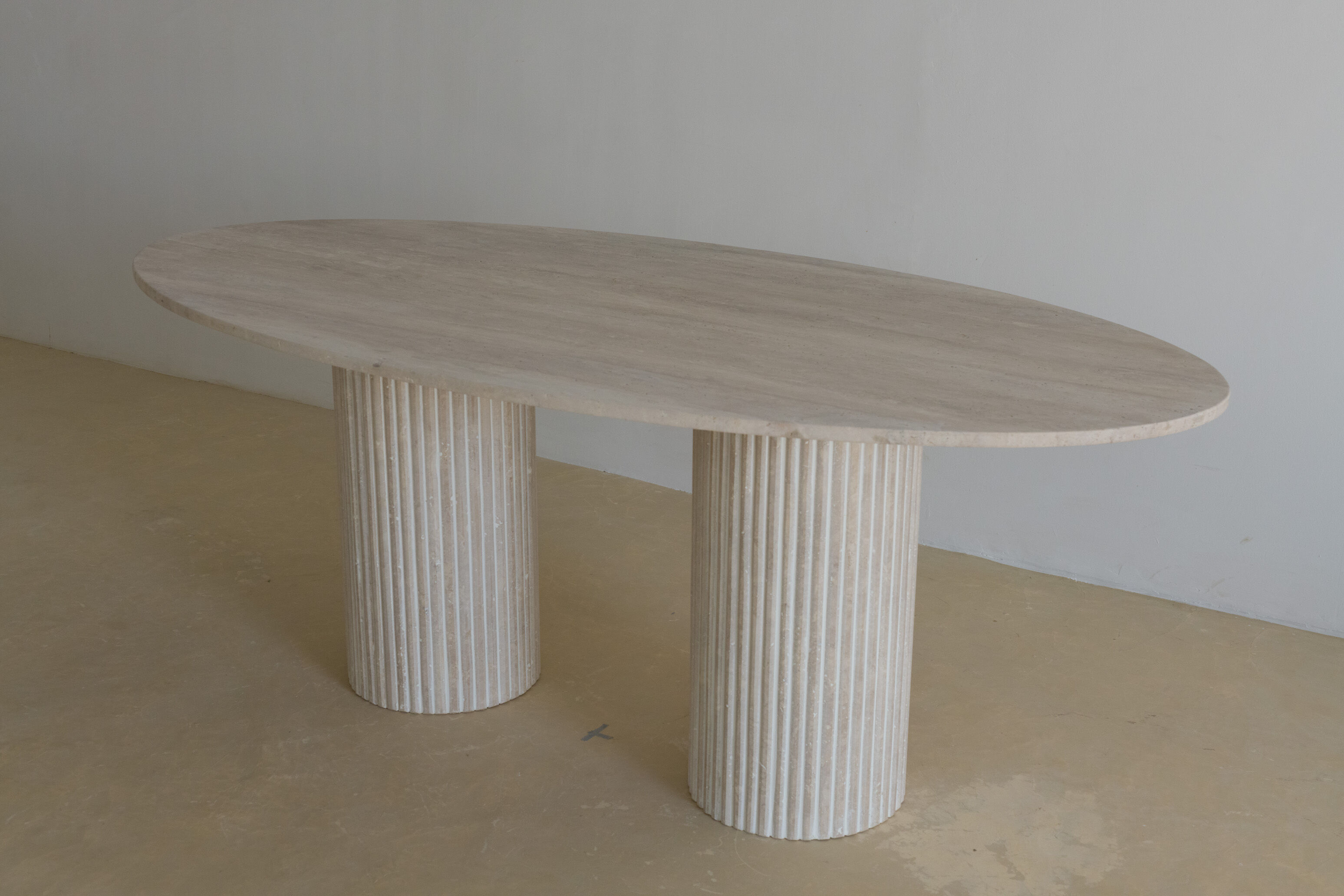 Oval dining table Calypso natural travertine, striated foot 200x100