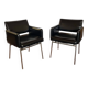 Pair of vintage armchairs in black faux leather and chrome metal.