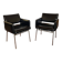 Pair of vintage armchairs in black faux leather and chrome metal.