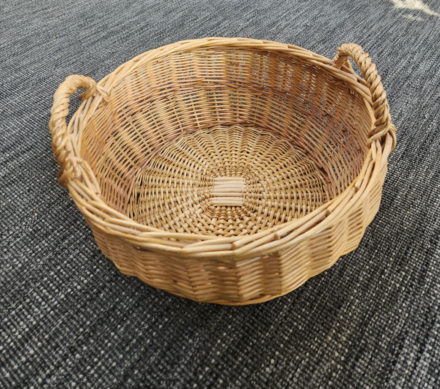 Large round wicker basket with handles