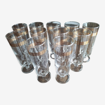 Lot de 11 flûtes à champagne en verre vintage frise géométrique dorée