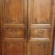 Louis XIV period wardrobe in solid oak, decorated with superb carvings