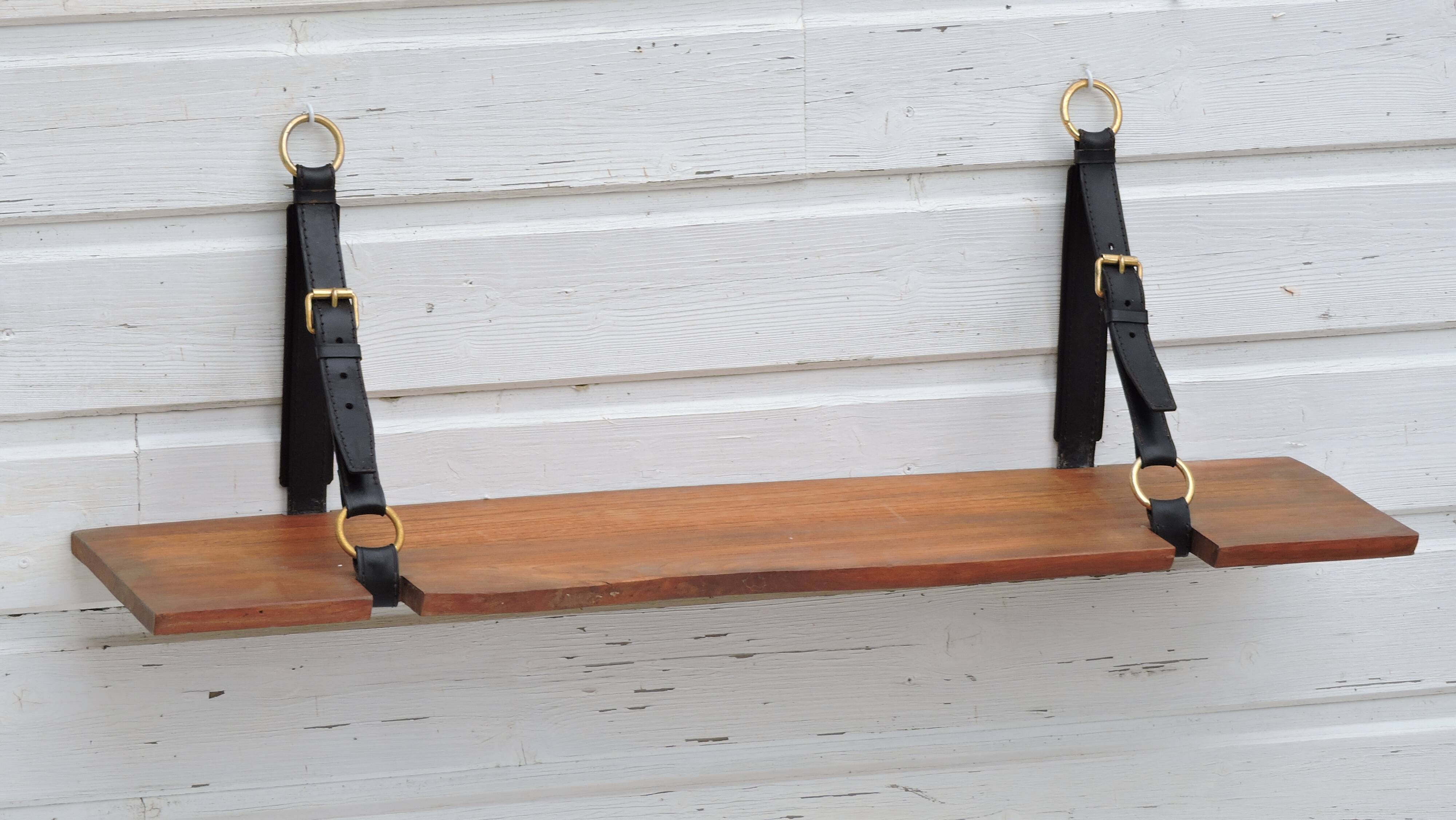 Elm and leather shelf, distributed by the Maison et Jardin Gallery in the 60