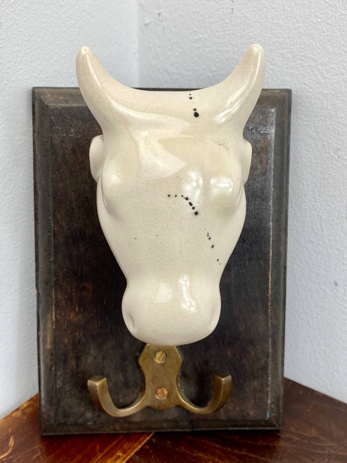 Old ceramic and wood coat hook