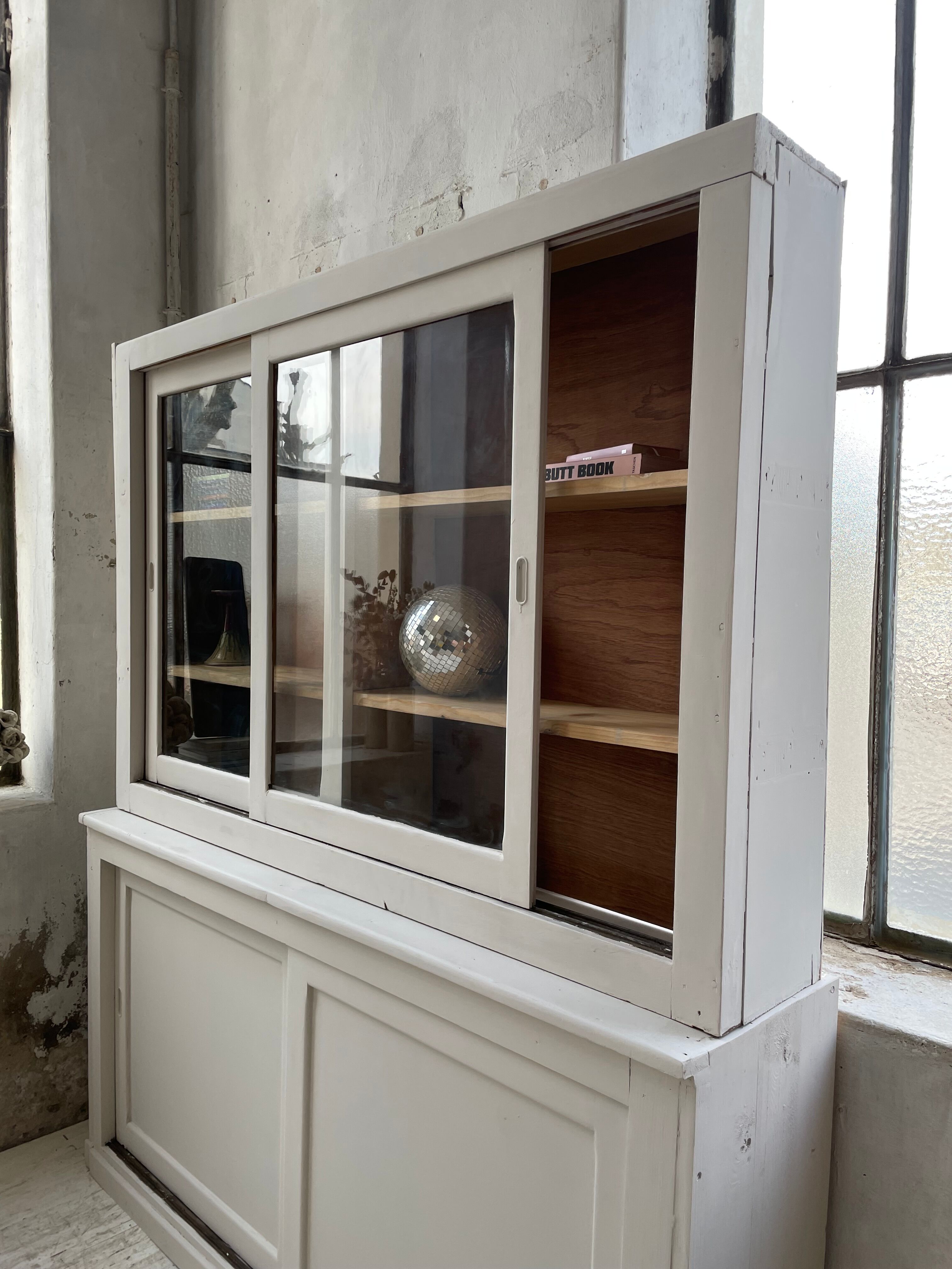Library showcase ivory white sliding doors