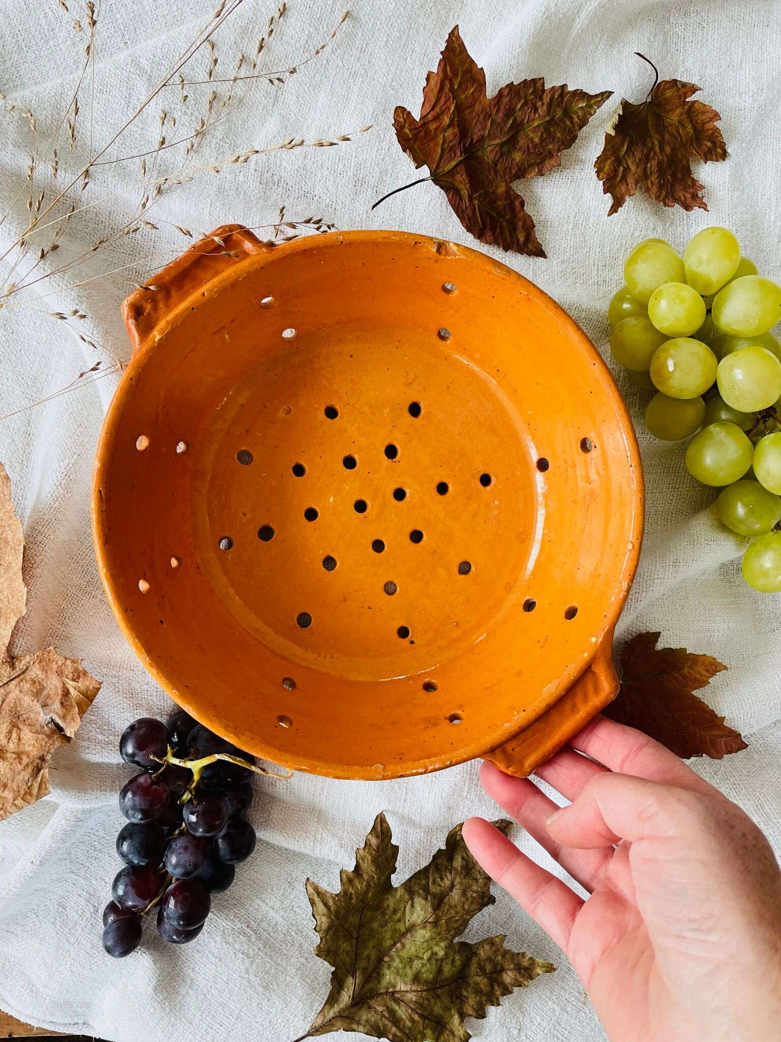 Old terracotta strainer