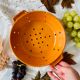 Old terracotta strainer