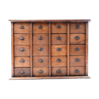 Furniture with 20 wooden drawers