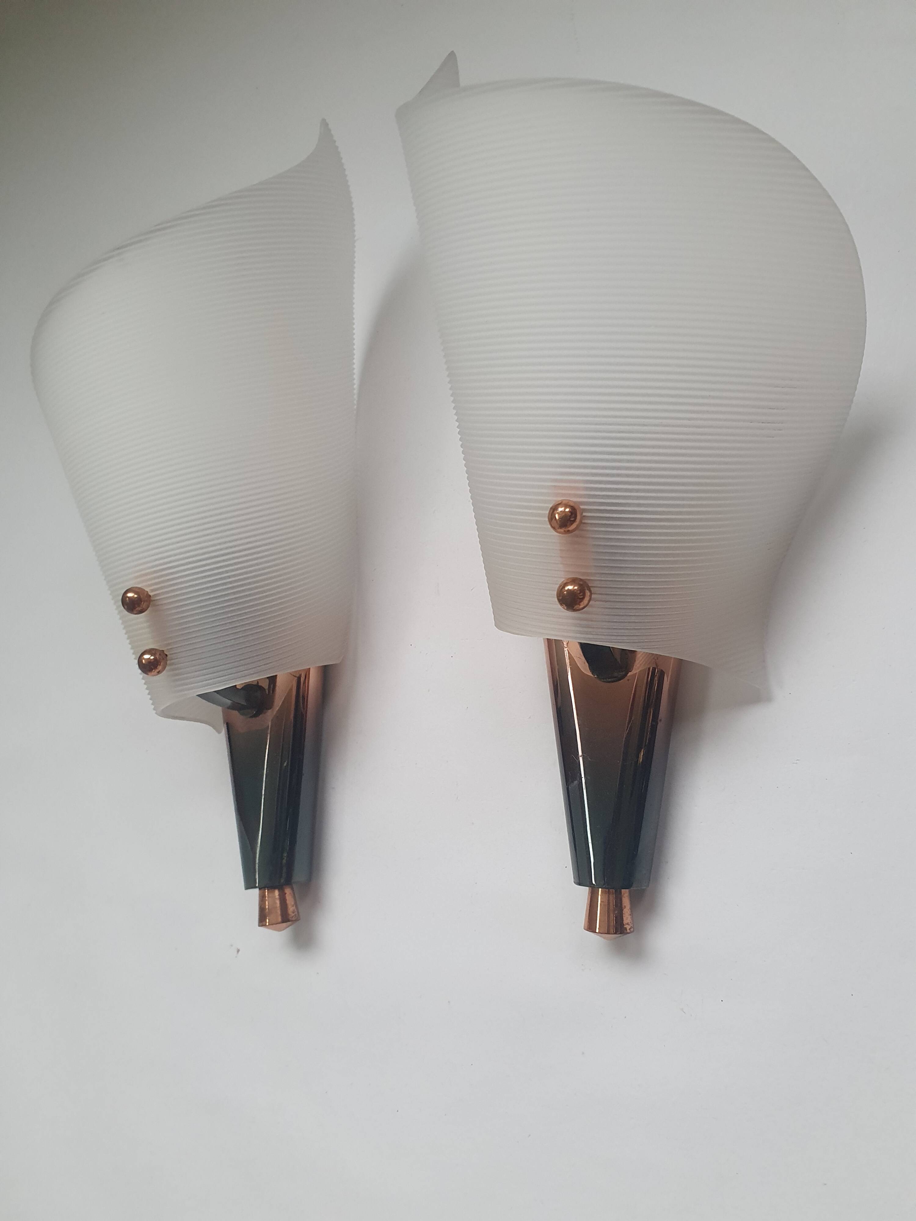 Pair of copper and plexiglass torch wall lights from the 1960s