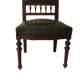 6 English style mahogany chairs covered with imitation green leather.