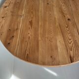 Round wooden table with flaps