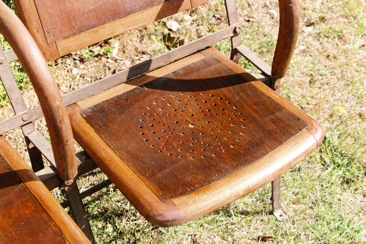 Row of theater folding seats, early twentieth century