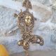 Antique brass coat hook