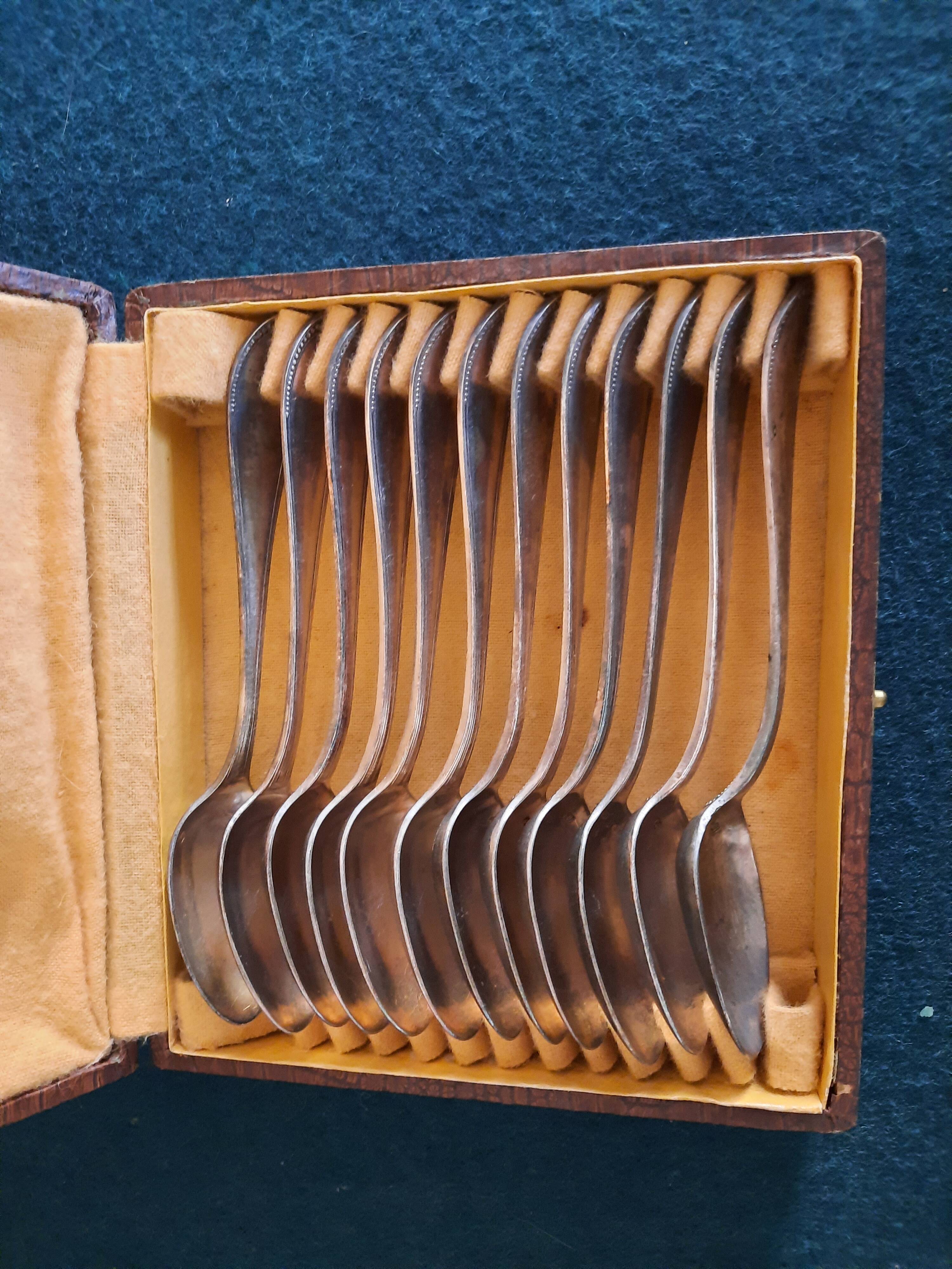 12 teaspoons silver metal