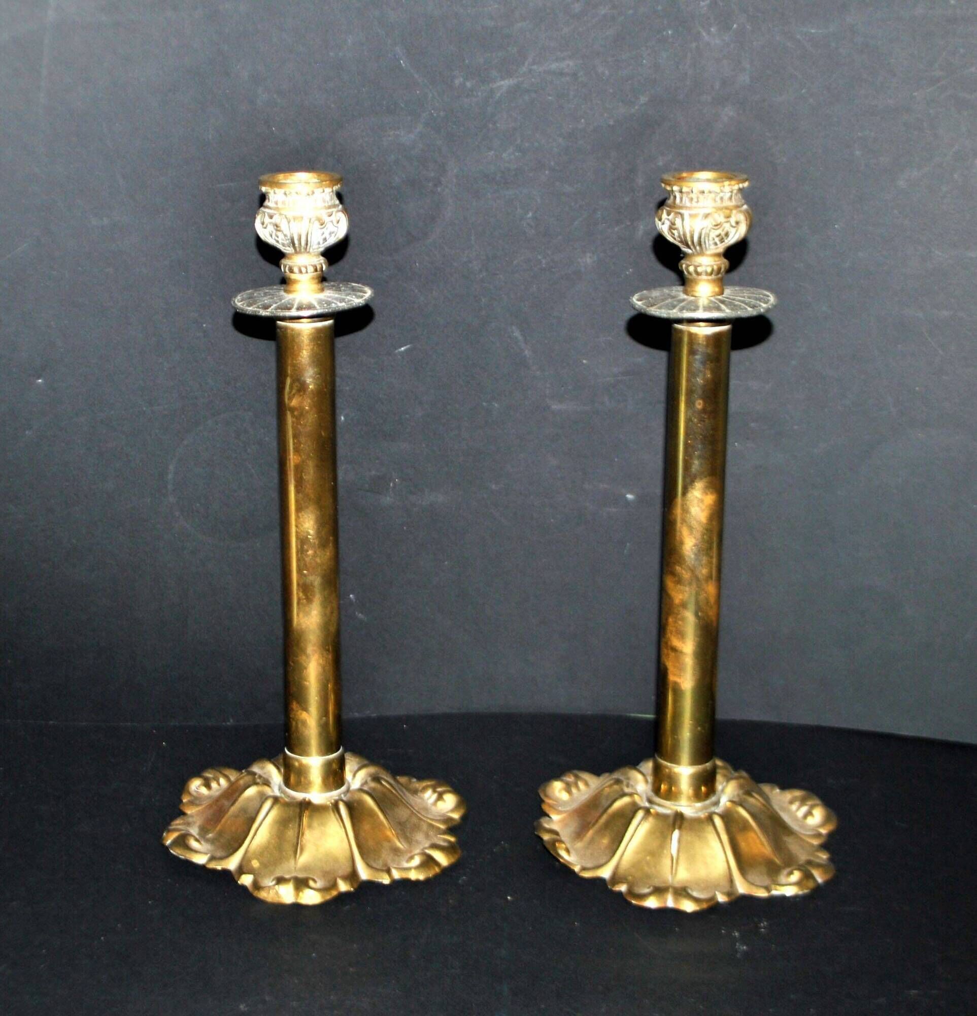 Lot of 2 antique brass and gilded bronze candle holders with acanthus decoration.