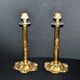 Lot of 2 antique brass and gilded bronze candle holders with acanthus decoration.