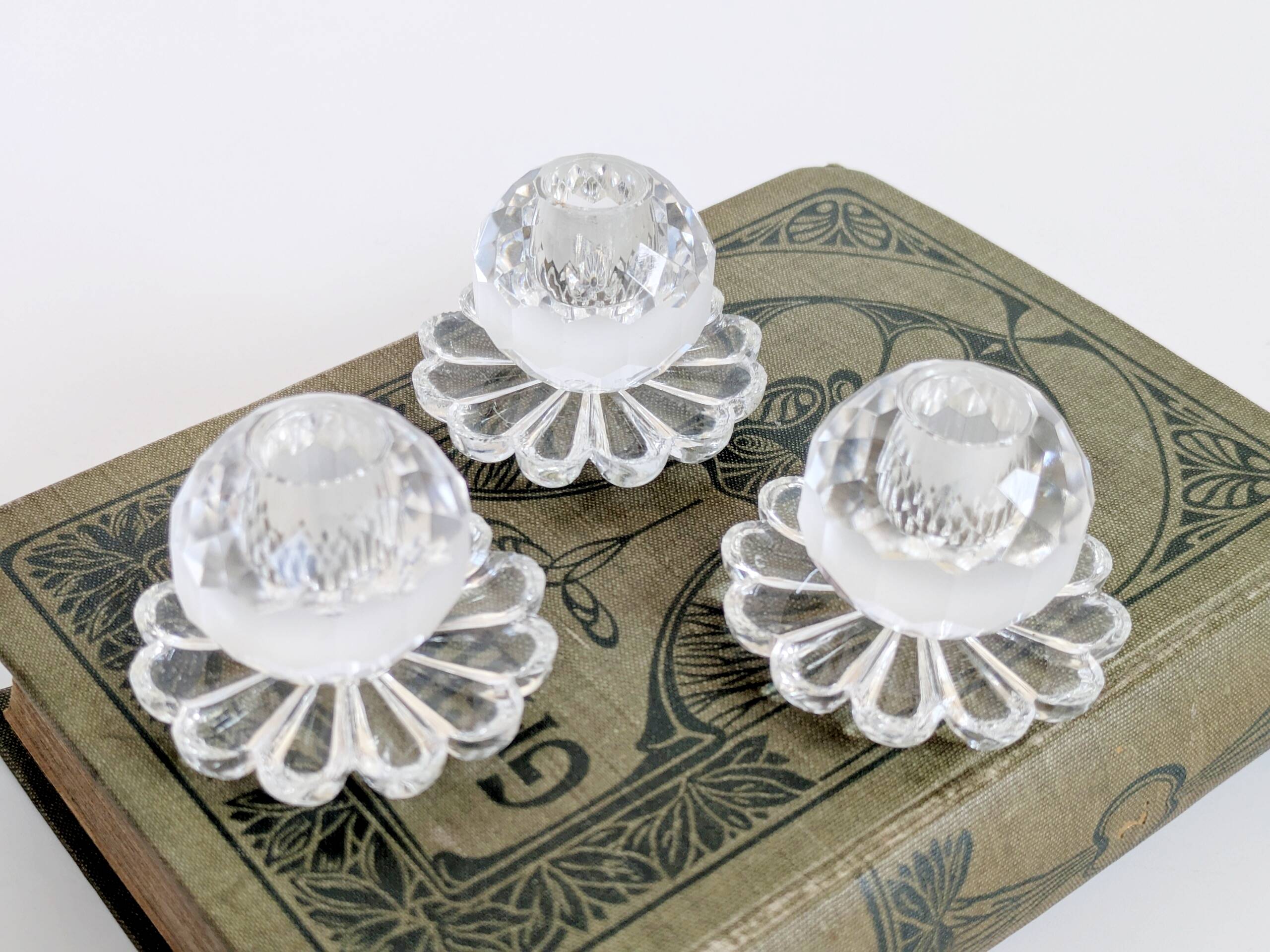 Lot of 3 vintage faceted crystal candle holders with flower base for slim candles.
