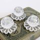 Lot of 3 vintage faceted crystal candle holders with flower base for slim candles.