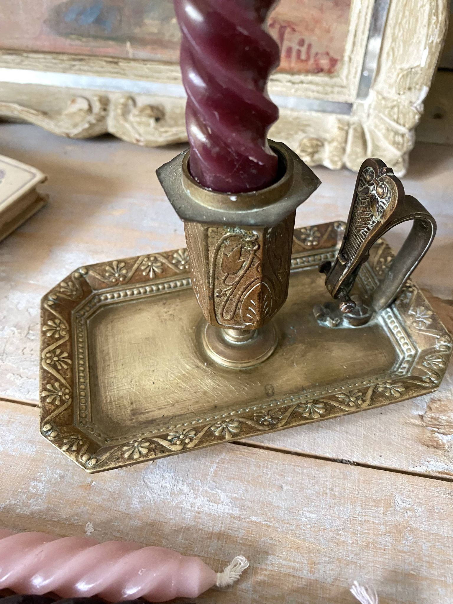 Antique brass thumb candle holder