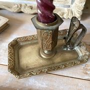 Antique brass thumb candle holder