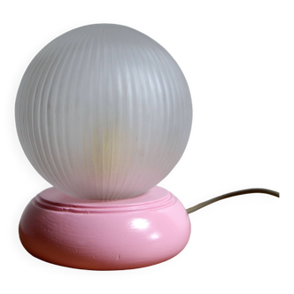 Pink table lamp and glass globe