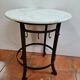 Iron pedestal table and marble top