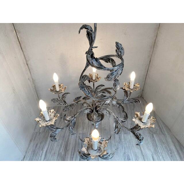 Contemporary brunish-clay florentine wrought iron leafs chandelier