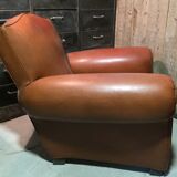 Club armchair moustache in brown leather