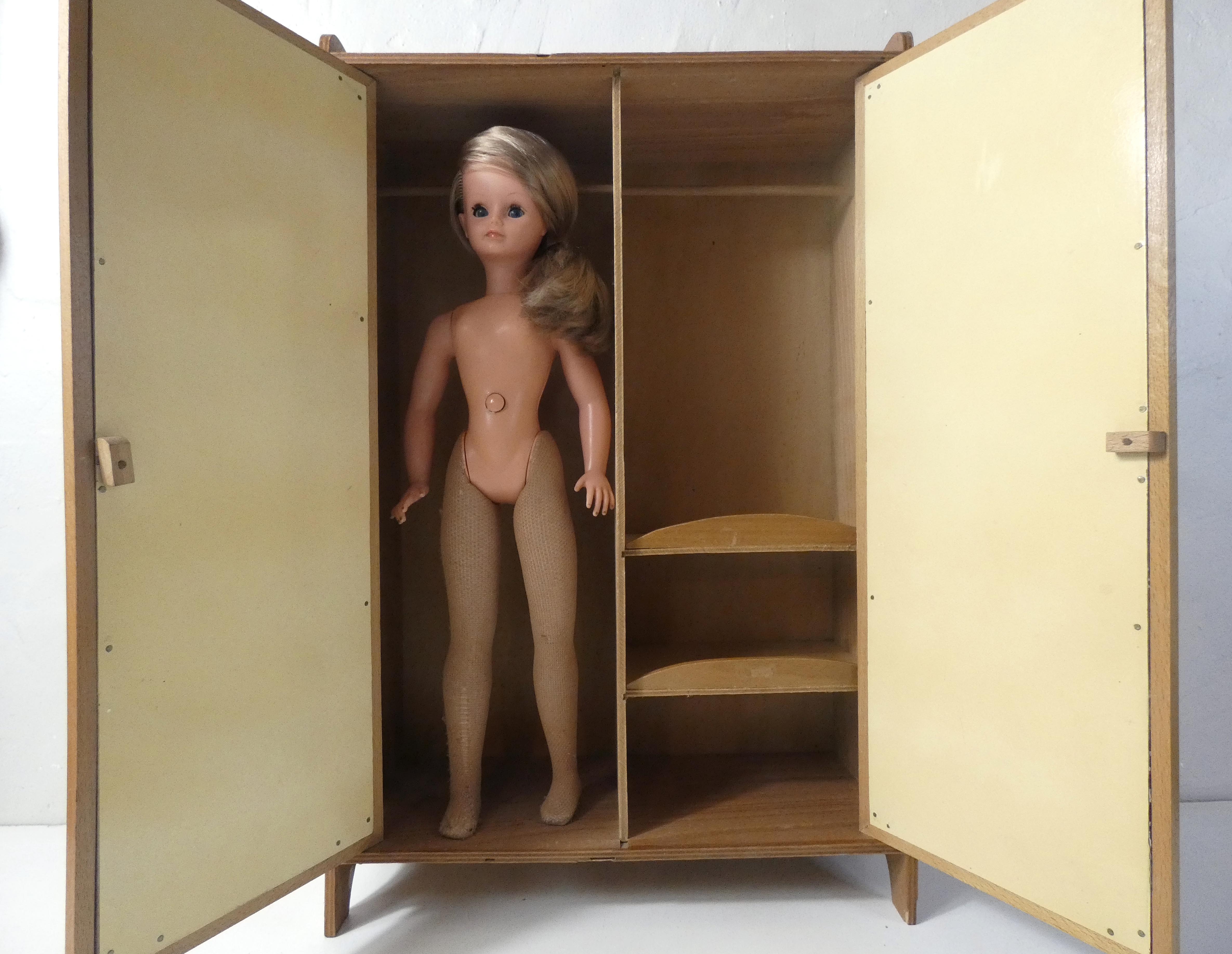 Rattan doll cabinet