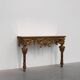 Console murale dorée et sculptée de style baroque italien du XXe siècle