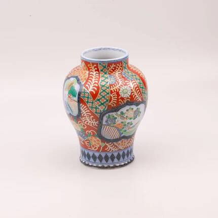 Vintage porcelain vase in the style of Imari by Petrus Regout Maastricht.