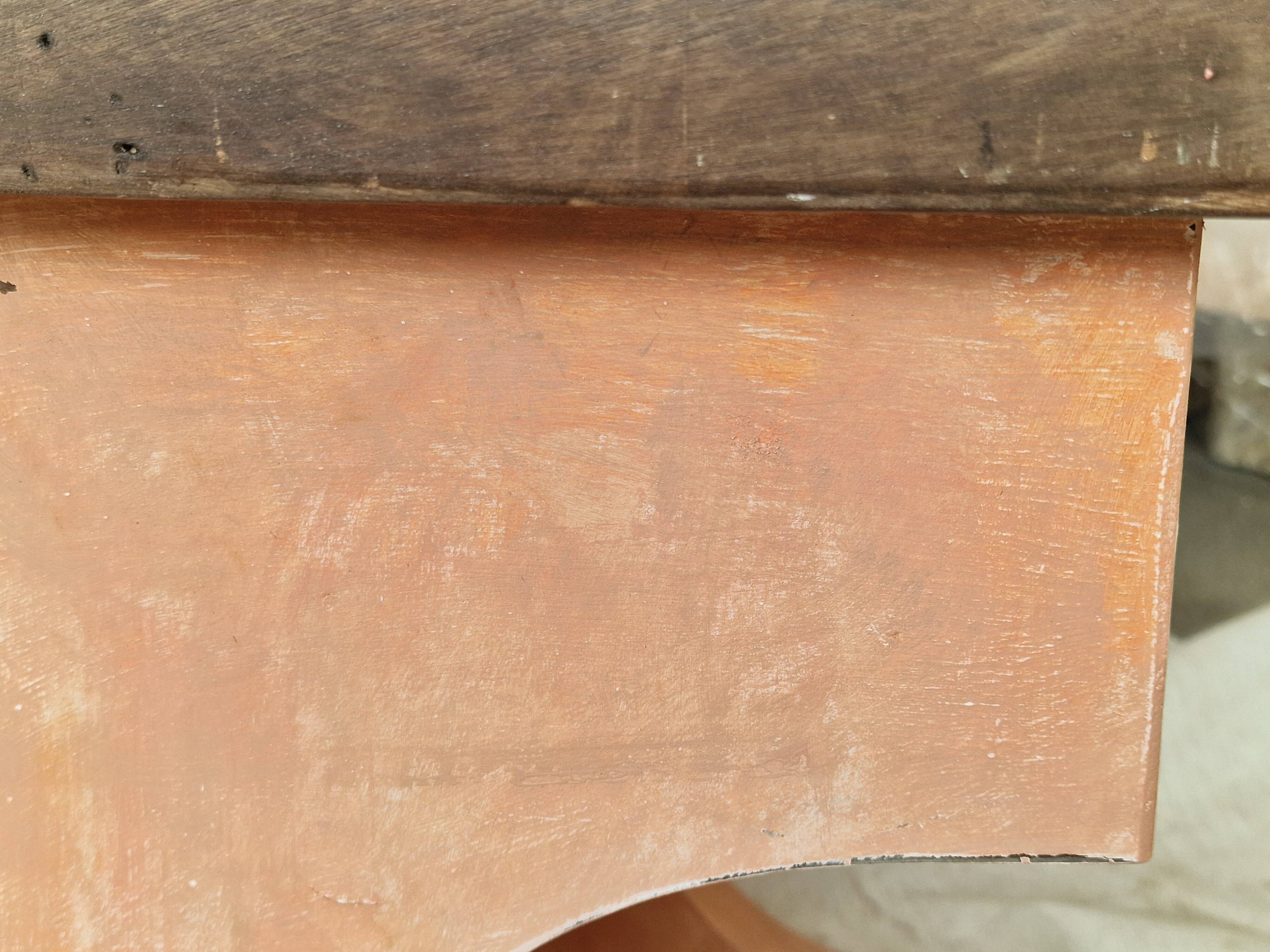 Pair of orange-pink patinated bedside tables