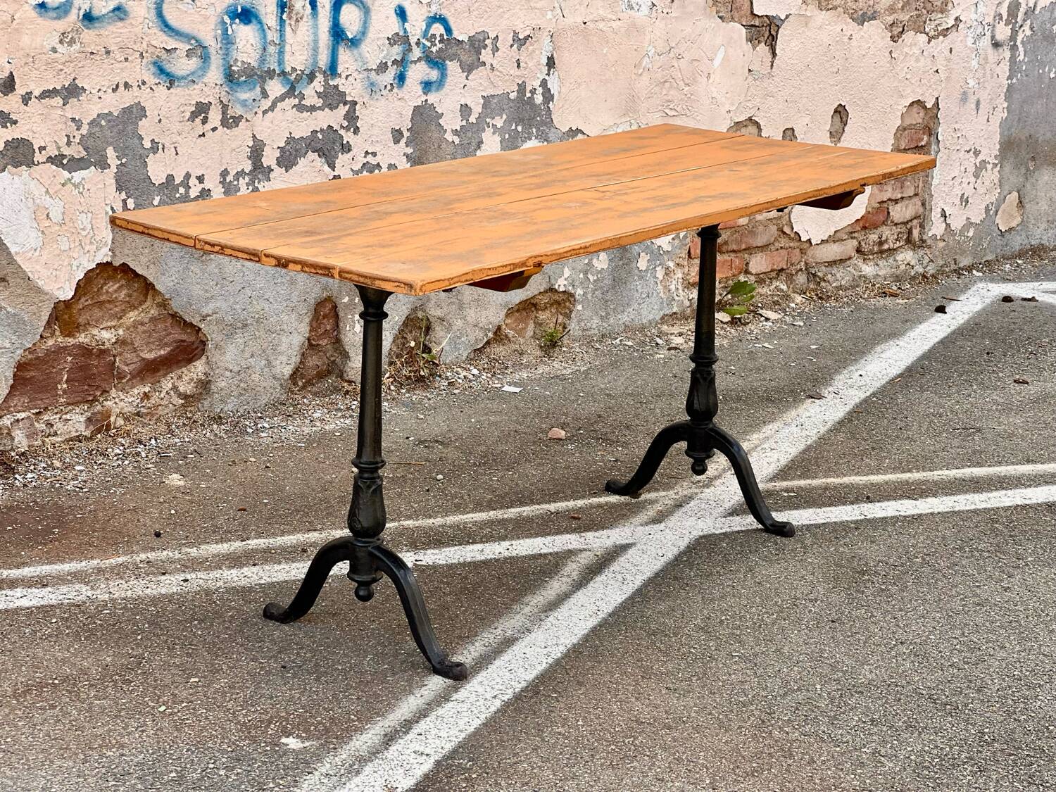 Antique bistro table with cast iron legs