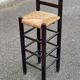 High bar stool in dark solid wood and straw 75cm