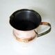 Old pitcher made of tinned copper