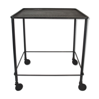 Mathieu Mategot's black wheelie table, 1950