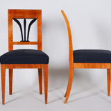 Pair of Biedermeier dining chairs made in Czechia circa 1830s. Restored Cherry.