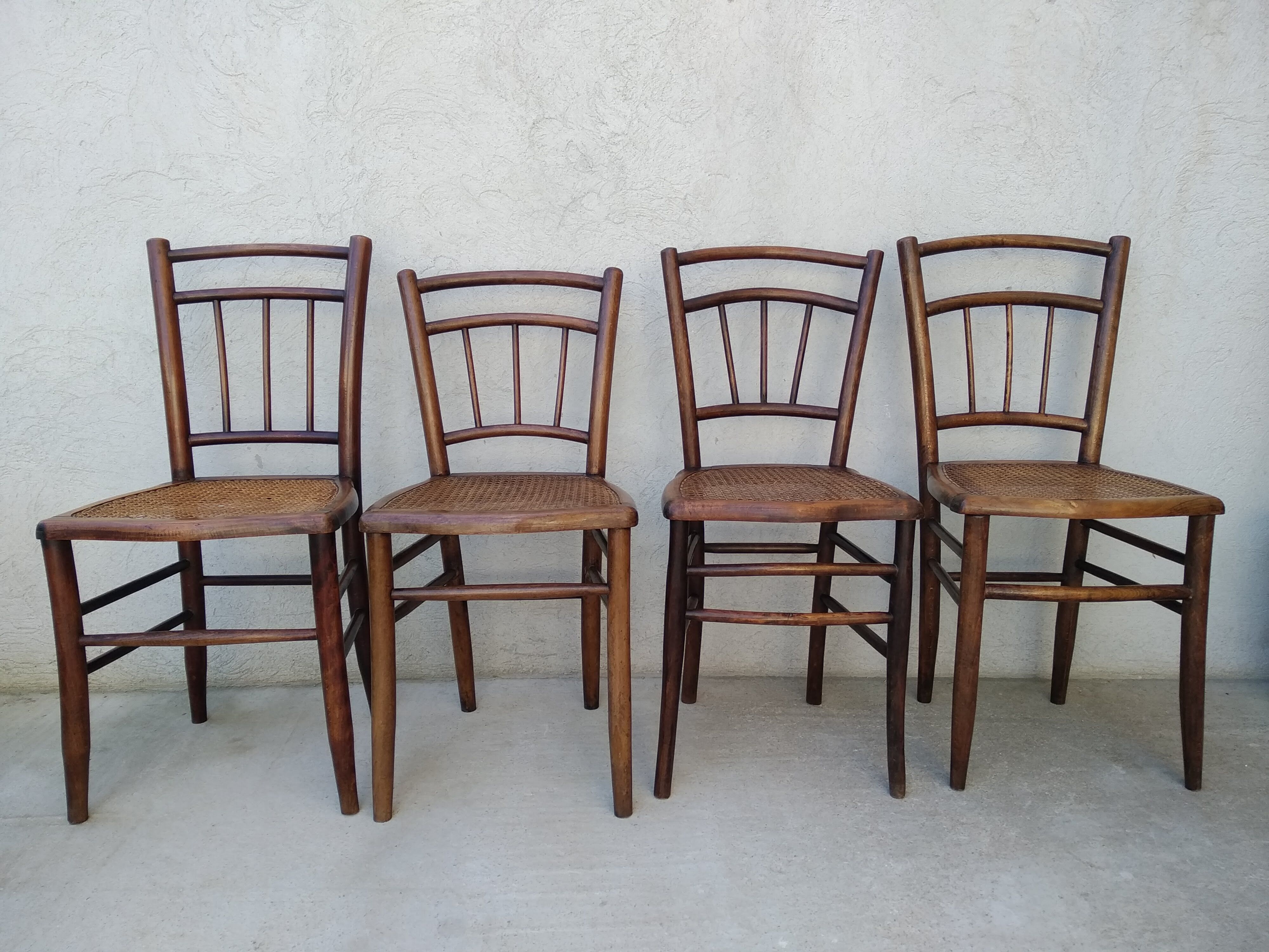 Set of 4 antique bistro chairs canned seats